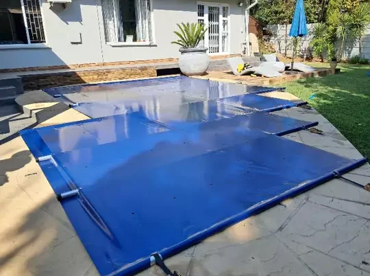 Pool safety cover installed by Wonders Pools