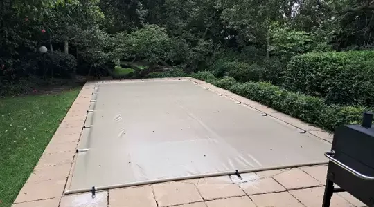 Pool safety cover installed by Wonders Pools