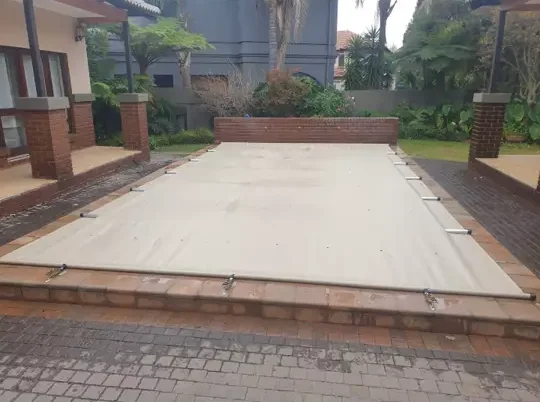 Pool safety cover installed by Wonders Pools